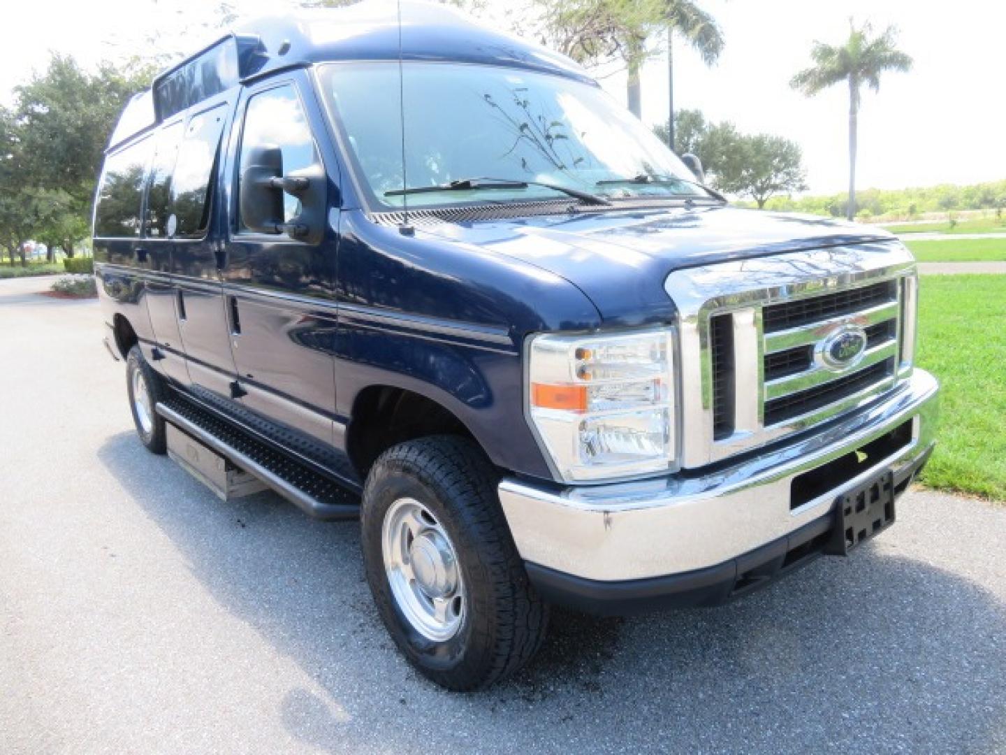 2011 Dark Blue /Gray Ford E-Series Wagon E-350 XLT Super Duty (1FBNE3BS4BD) with an 6.8L V10 SOHC 20V engine, located at 4301 Oak Circle #19, Boca Raton, FL, 33431, (954) 561-2499, 26.388861, -80.084038 - You are looking at a Gorgeous 2011 Ford Econoline E350 XLT Norcal Max High Top Handicap Wheelchair Conversion Van with 6.8L V10, 15K Original Miles, 9 Inch Lowered Floor, Braun UVL Side Entry Wheelchair Lift, Remote Control Power Side Entry Doors, Expanded Side Entry Doors, Q Straint Tie Down, Syste - Photo#8